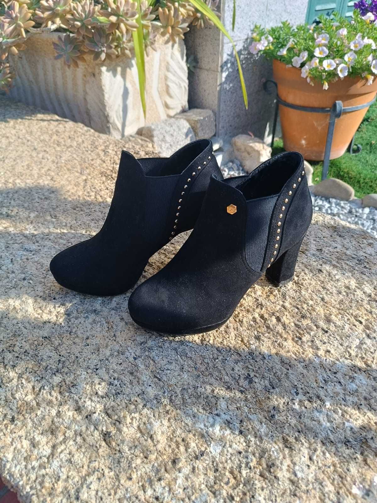 Botas de salto alto