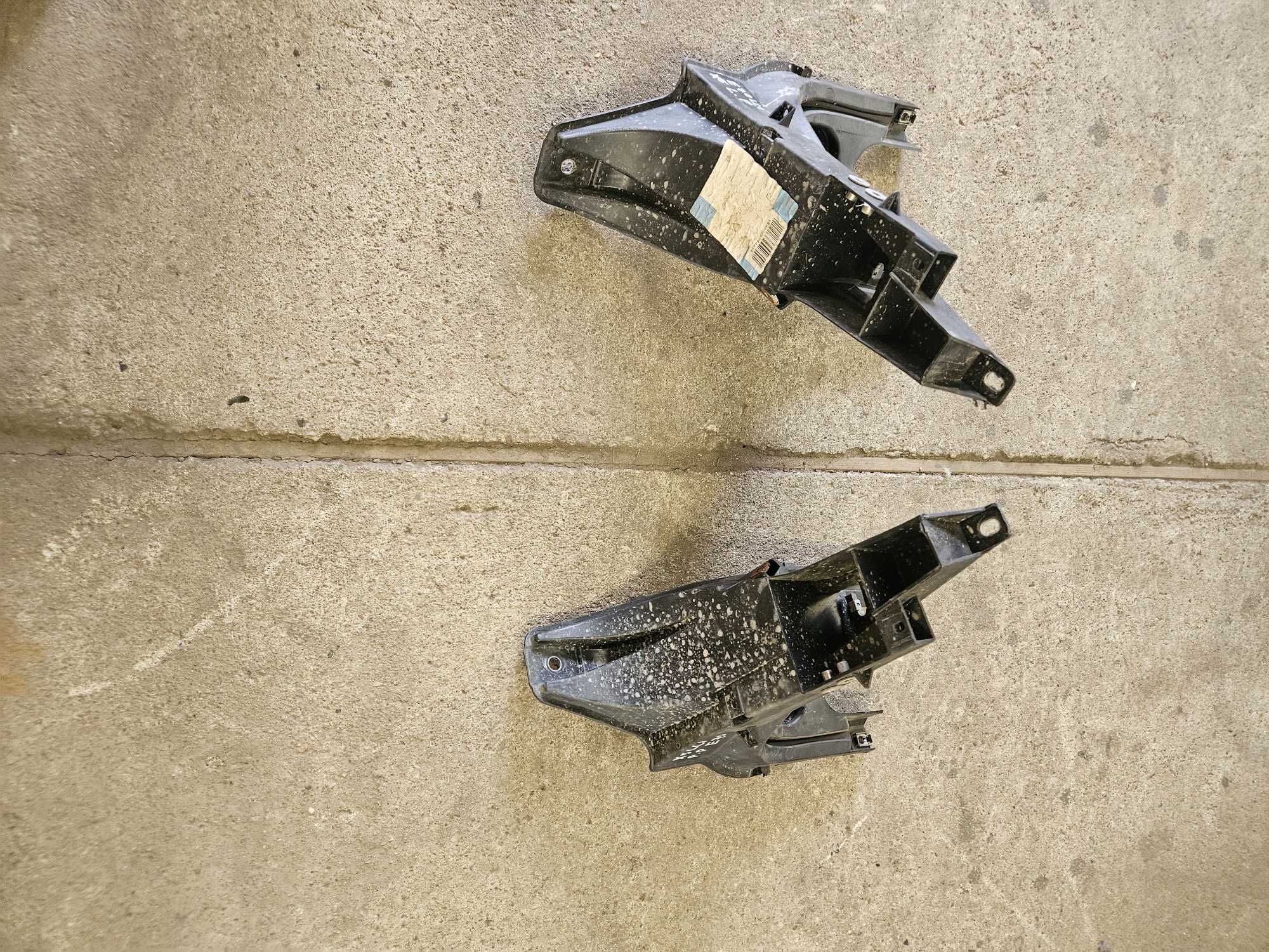 Uchwyt lampy przedniej prawy bmw x5 e70 lci
