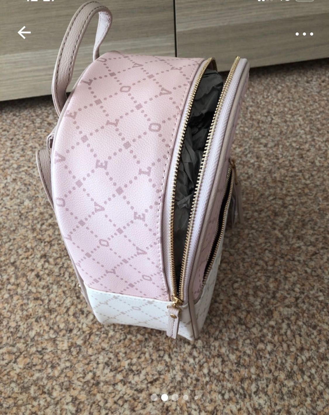 Mochila rosa e beje