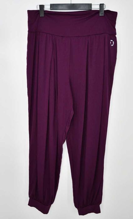 Elastyczne luźne spodnie dresowe plus size 48/50 fiolet Bonprix