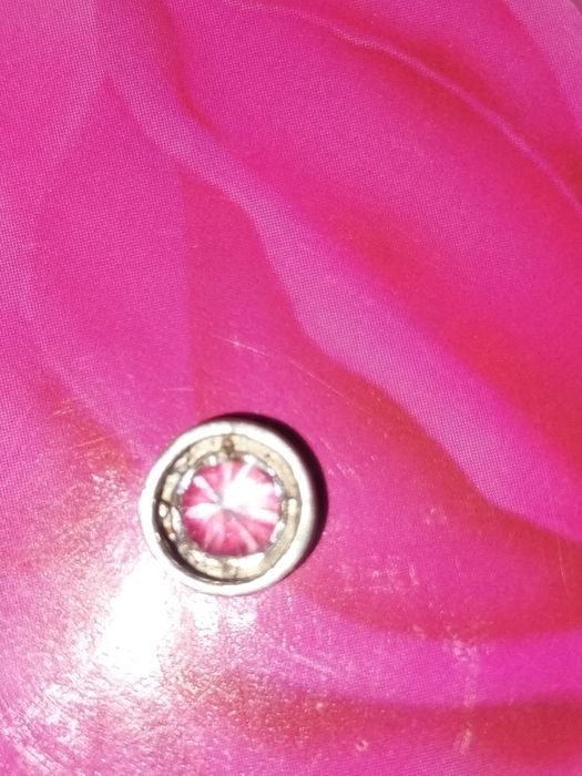 Серебряный Кулон с переливающимся камнем и золотой вставкой.