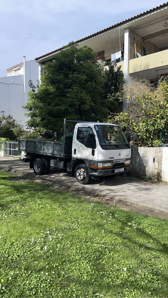 Recolha de entulho com carrinha