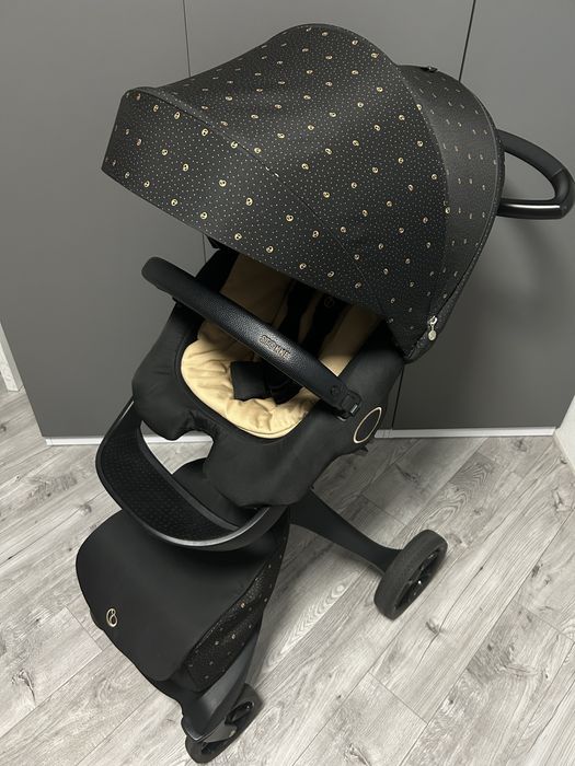 Stokke Gold Signature золота рама чорний візок