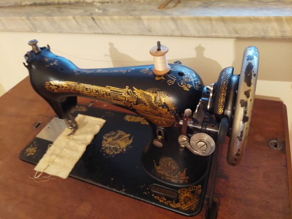 Máquina de costura singer antiga