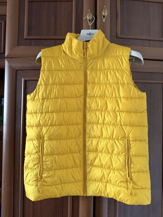 Нова жіноча жилетка