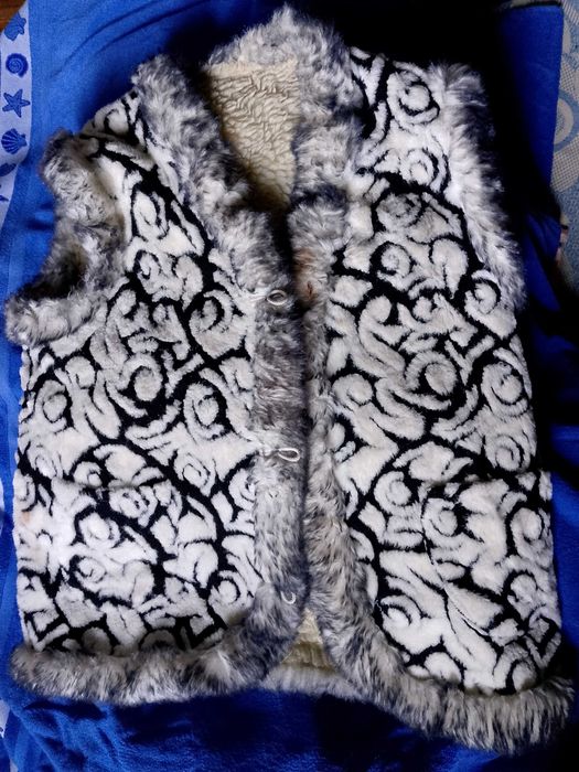 жилет из овчины согреет вас зимой