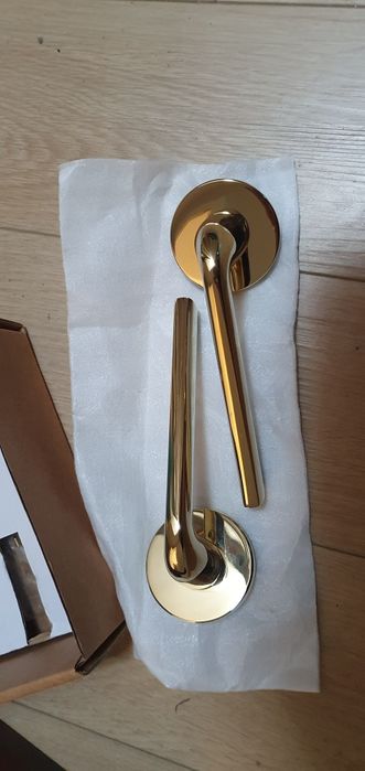 Klamka drzwiowa bella slim złota