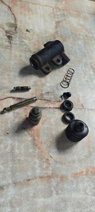 Оригинальний цилиндр сцепления рабочий на Geely CK