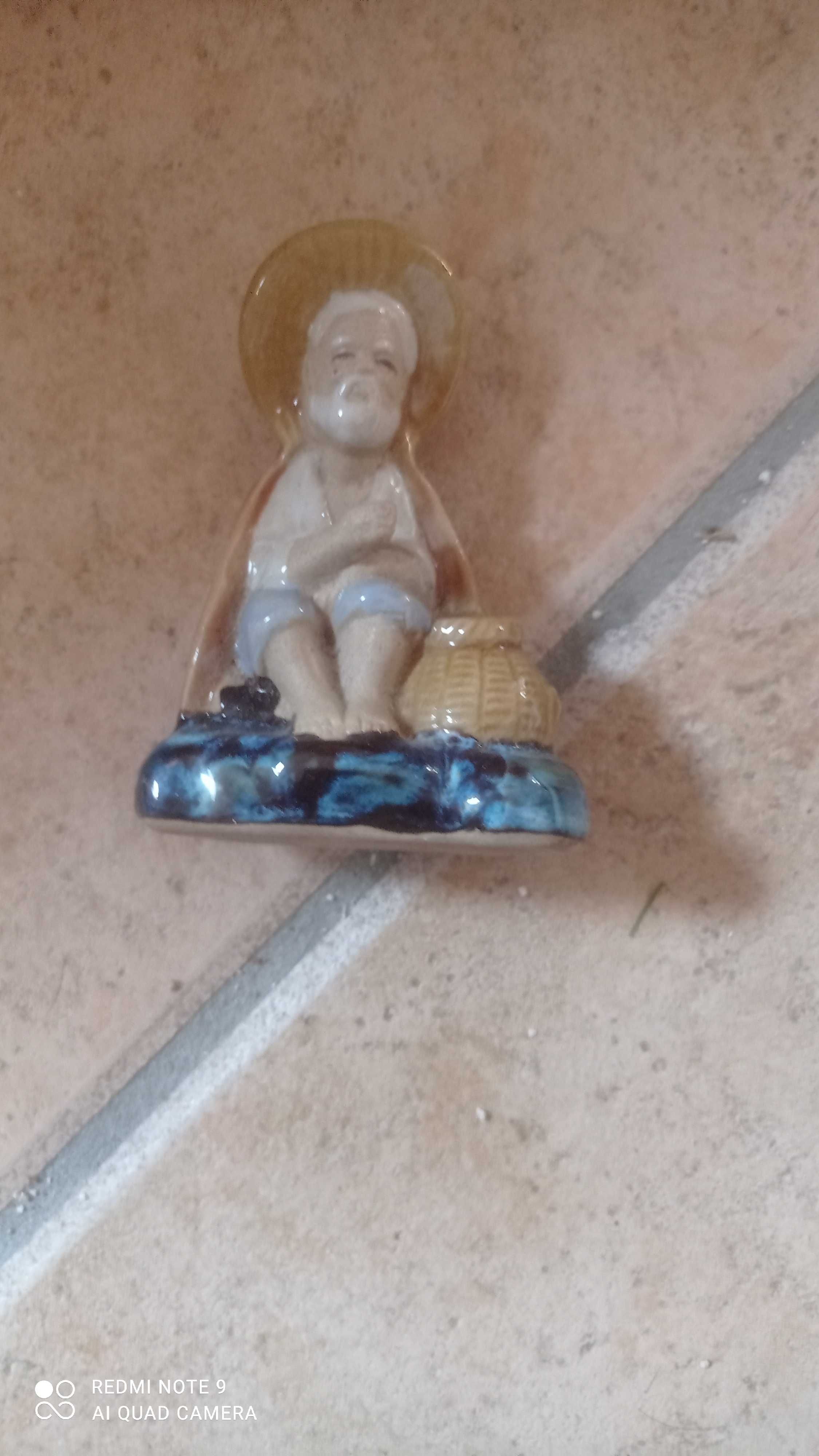 Boneco chinês de porcelana
