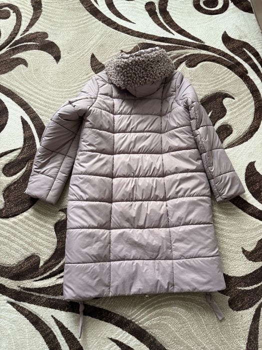 Продаю пуховик 52 розмір.