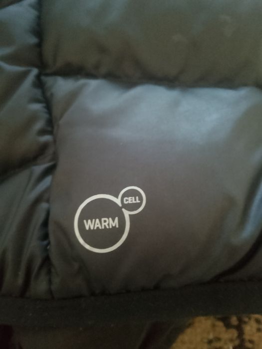 Пуховик фирма Puma.