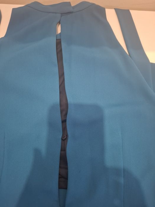 Macacão azul turquesa