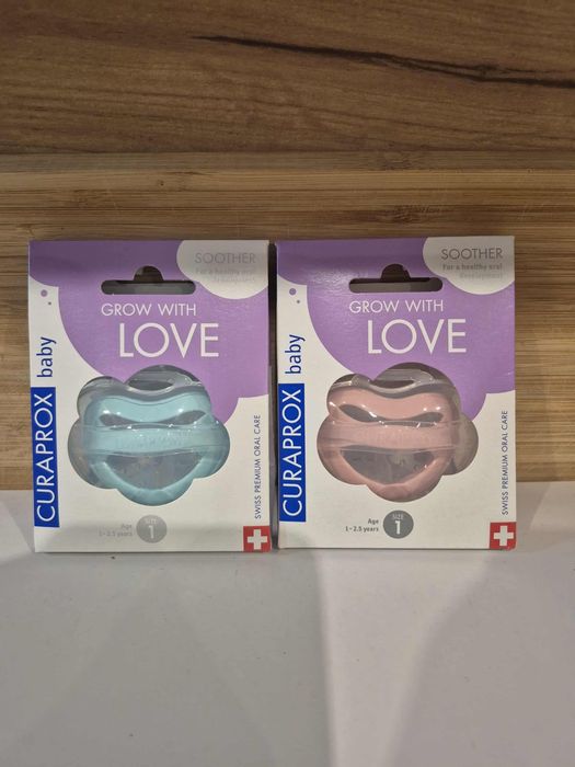 Nowy smoczek różowy lub  niebieski