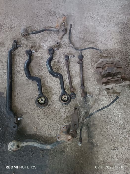 Стойки передні BMW E34 ричаги суппорт диски бмв е34 амортизатори цапфа