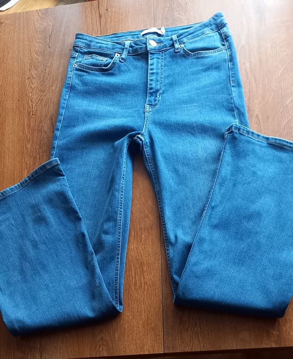 Spodnie jeansowe dzwony damskie 40 niebieskie