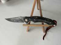 Складной нож из дамасской стали