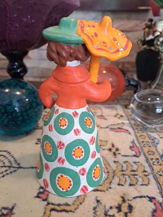 Boneca de barro antiga