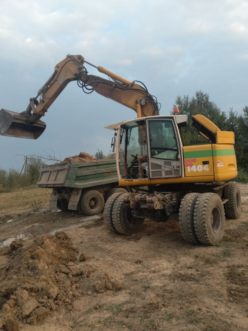 Оренда екскаватора та самоскидів