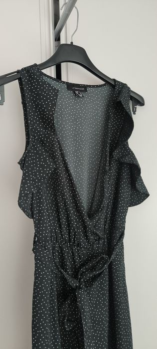 Macacão em tecido com padrao de bolinhas