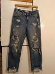 Spodnie Jeansy z przetarciami 36