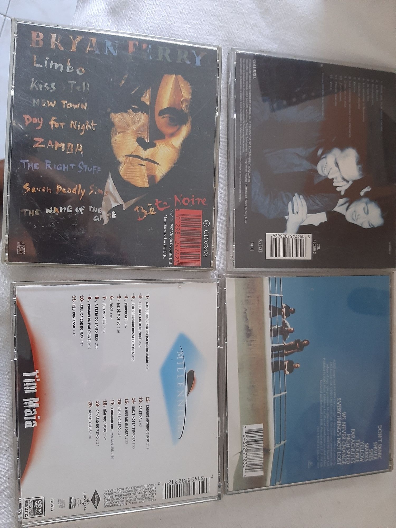 C. d. música originais como novos