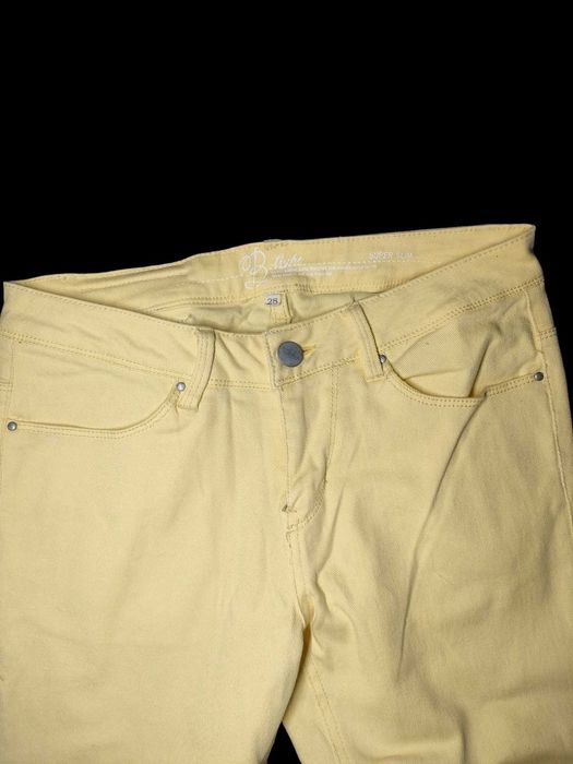 Cytrynowe jeansy slim r. 38
