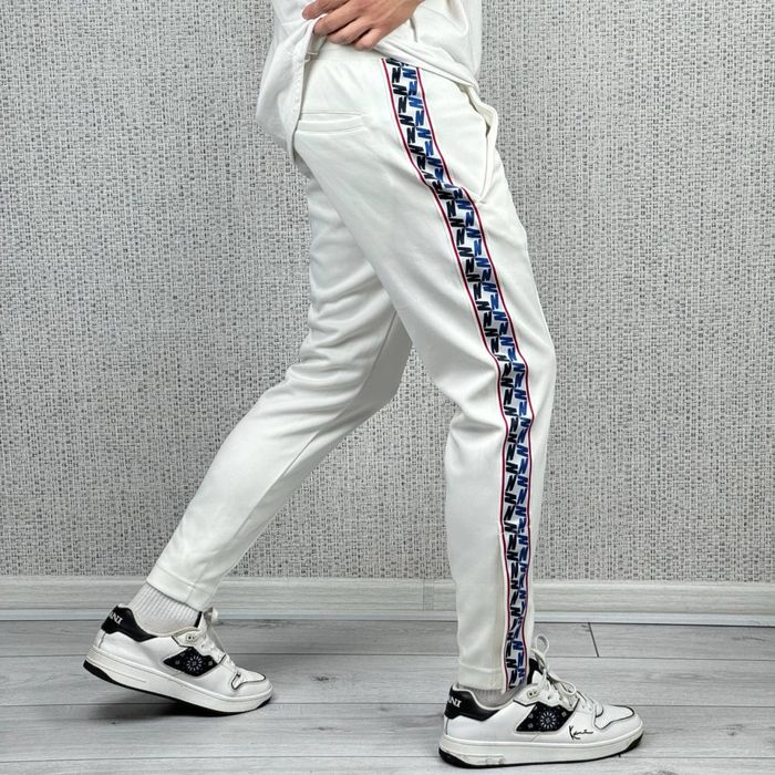 Спортивные штаны Nike Taped Pants спортивні штани найк теч фліс tech