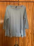 Camisola plissada azul bebé