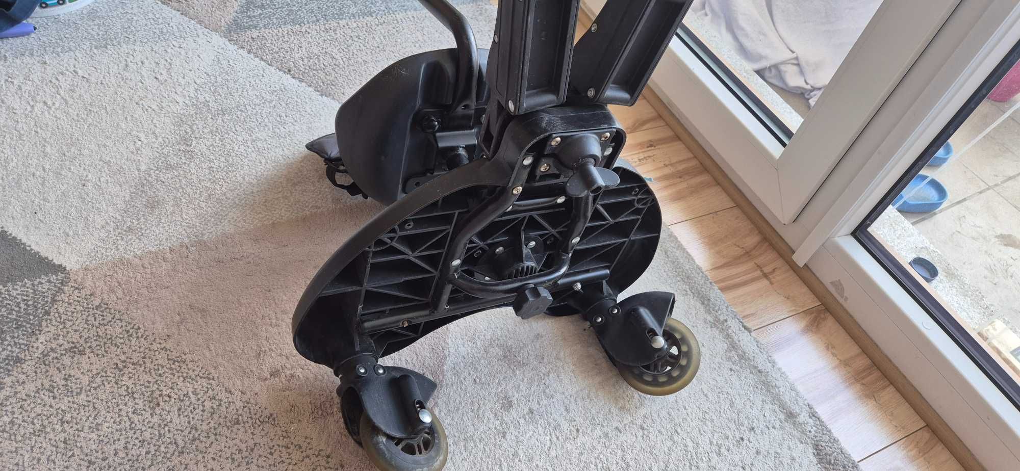 Dostawka do wózka,  prawdopodobnie  Moby System Mr Buggy