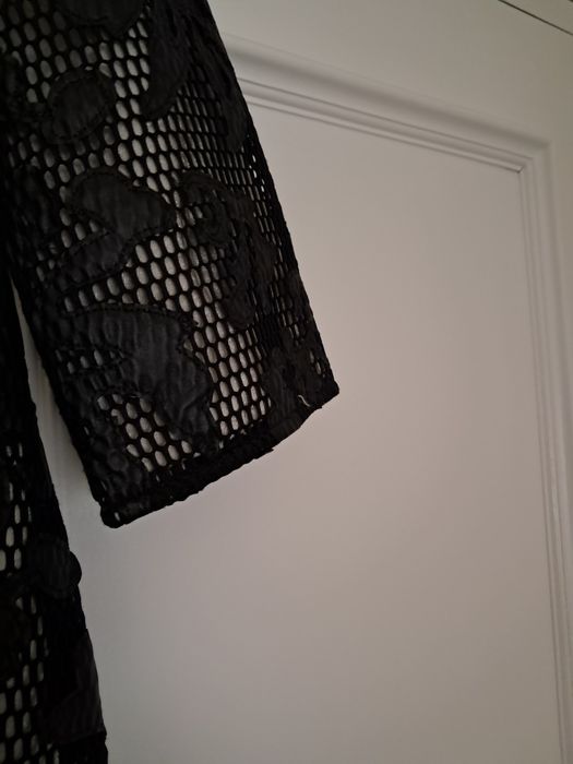 Casaco preto arrendado