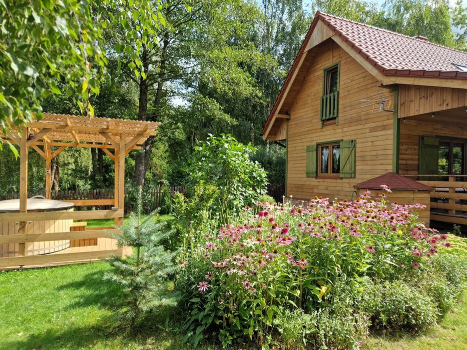 Drewniany domek na Mazurach. Trelkówko.