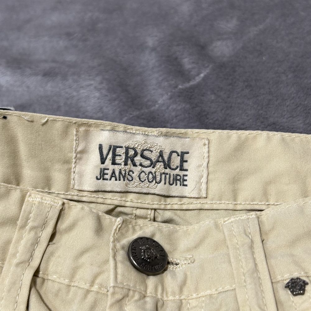 Spodnie chino versace jeans couture mini logo patch