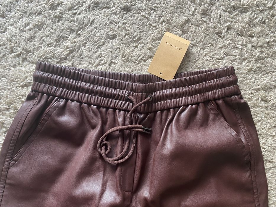 Шкіряні штани (кожзам) Promod, розмір 40