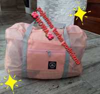 Różowa torba podróżna
