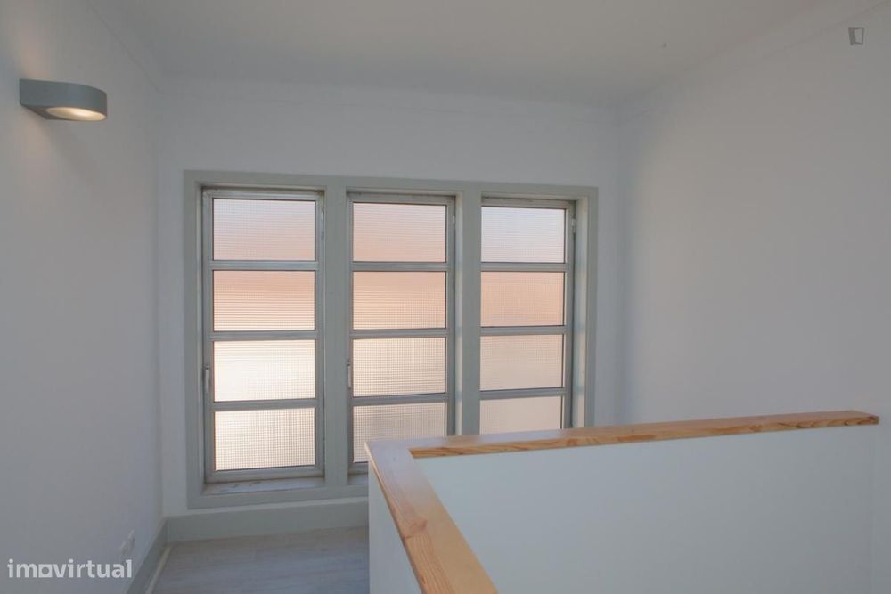 Quarto com cama de casal em apartamento com 4 quartos