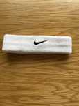 Biała opaska na głowie nike