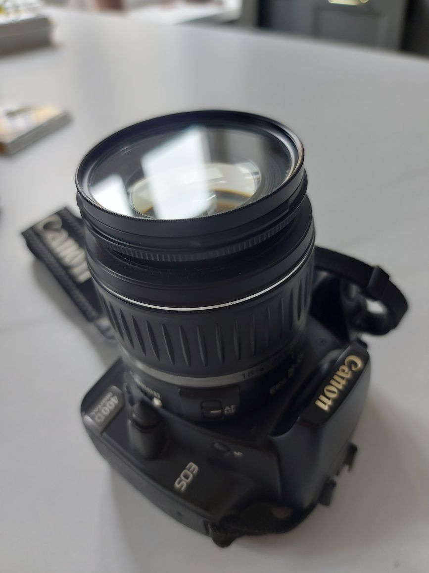 Canon EOS 400D + EF-S 18-55 kit.