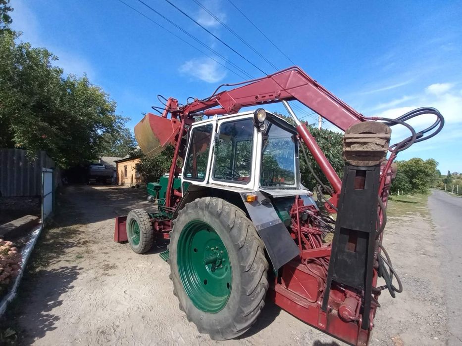 Грейферний погрузчик юмз