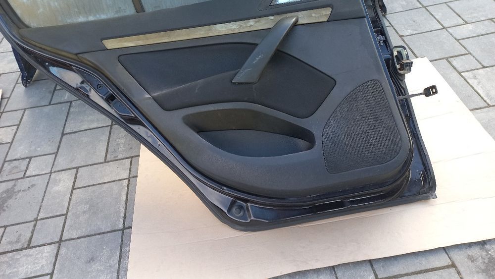 Skoda Octavia 2 04-08 drzwi tylne lewe lewy tyl liftbeck czarne 9910