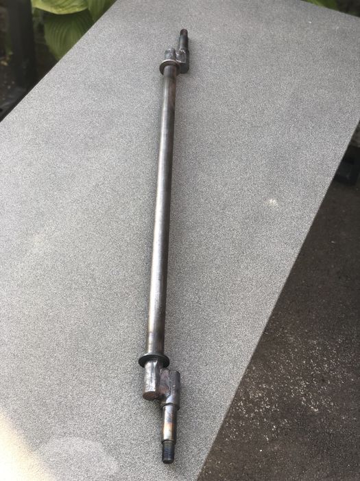 Вал грохота скатної дошки Вольво 800 - 1110