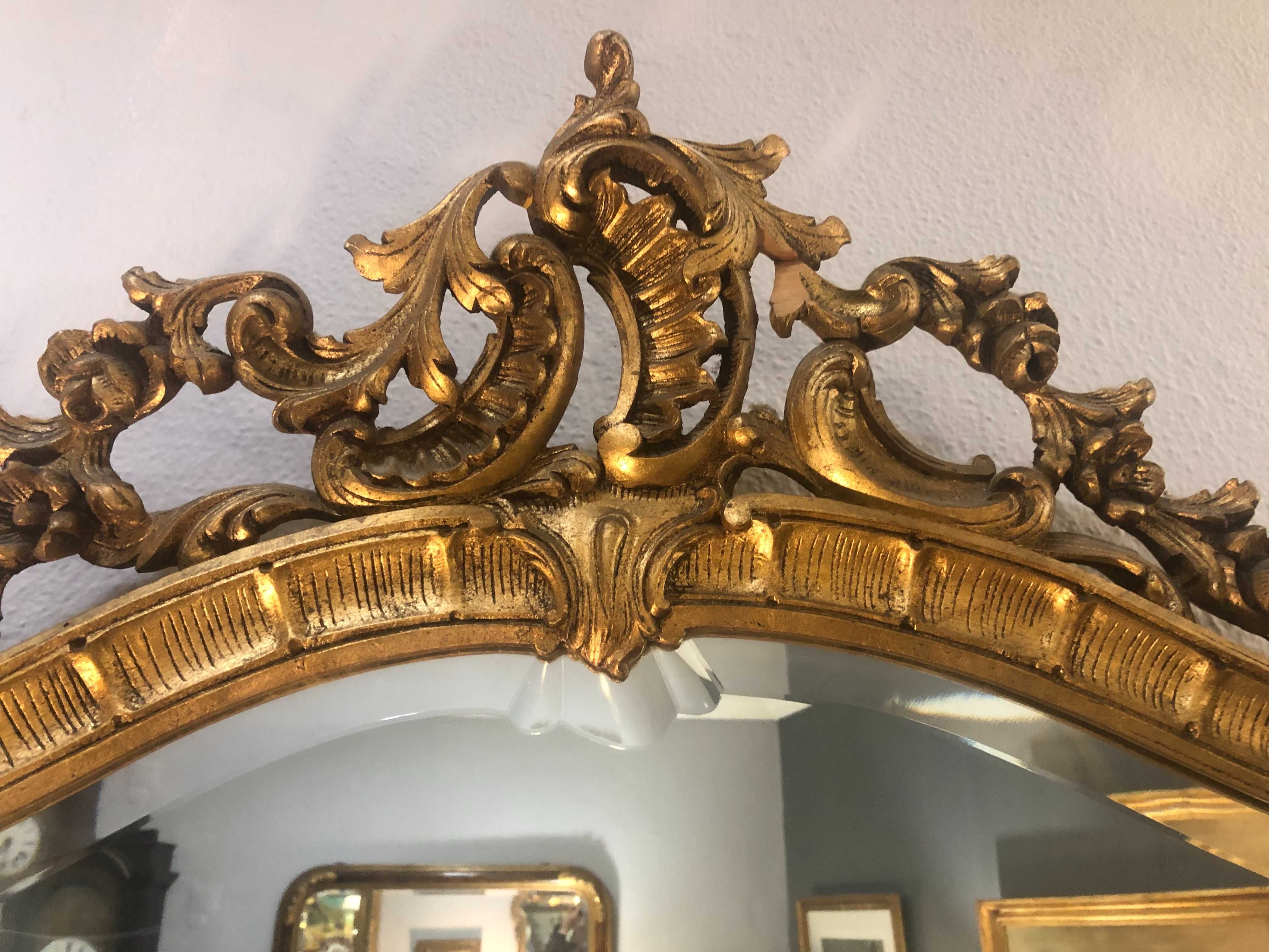 Espelho em madeira entalhada e dourada