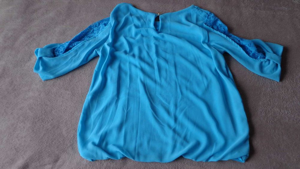 Бірюзова   блузка