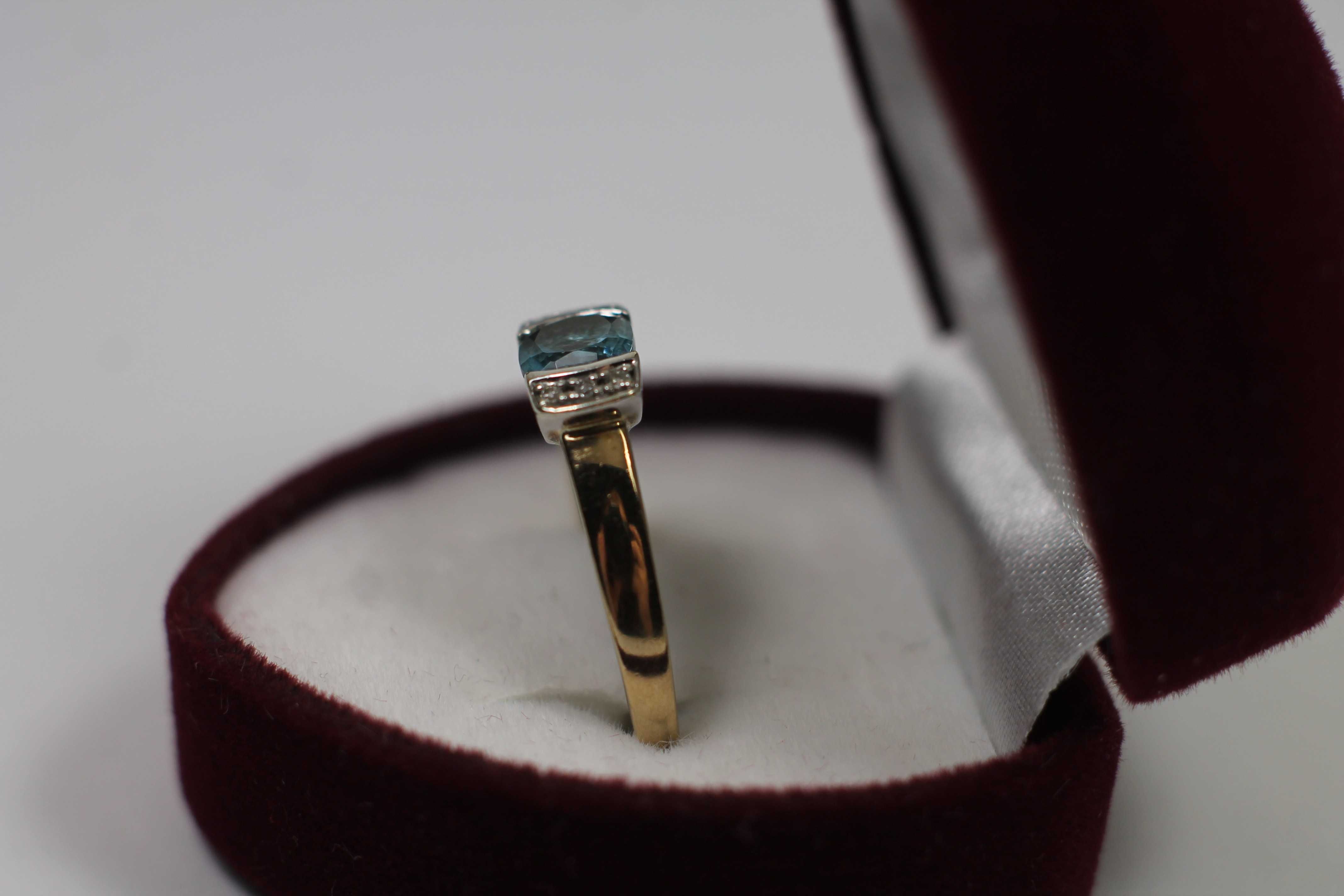 Złoty pierścionek p333 1,91g R11 topaz diamenty