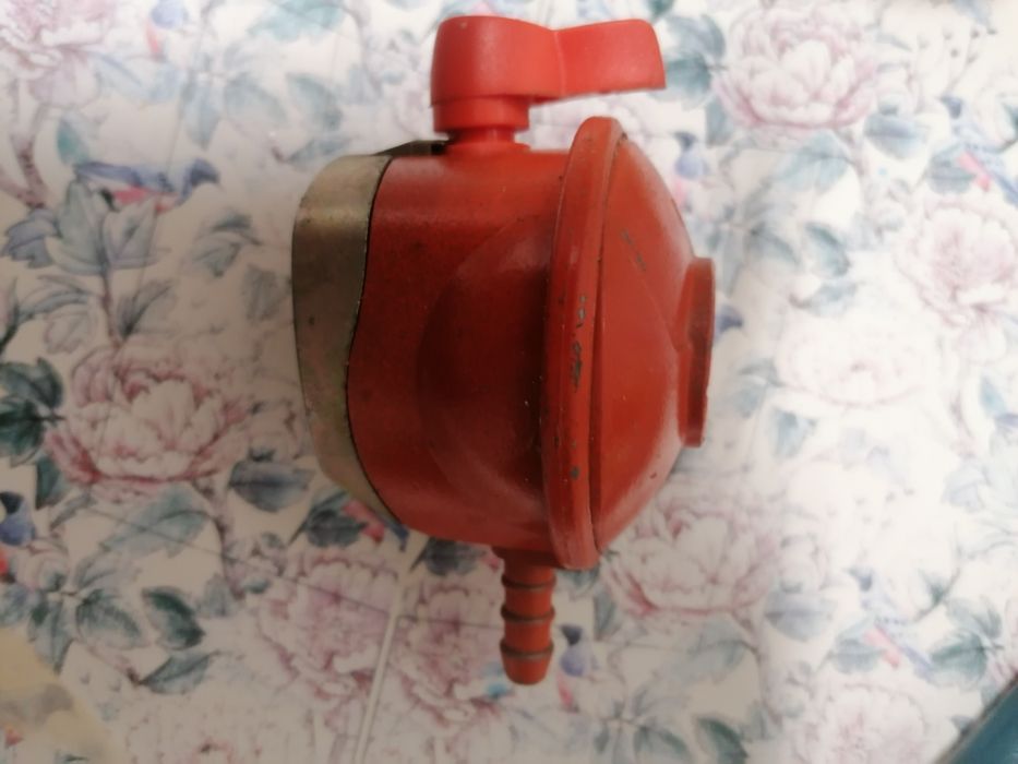Vasilhame de gaz com redutor para desocupar