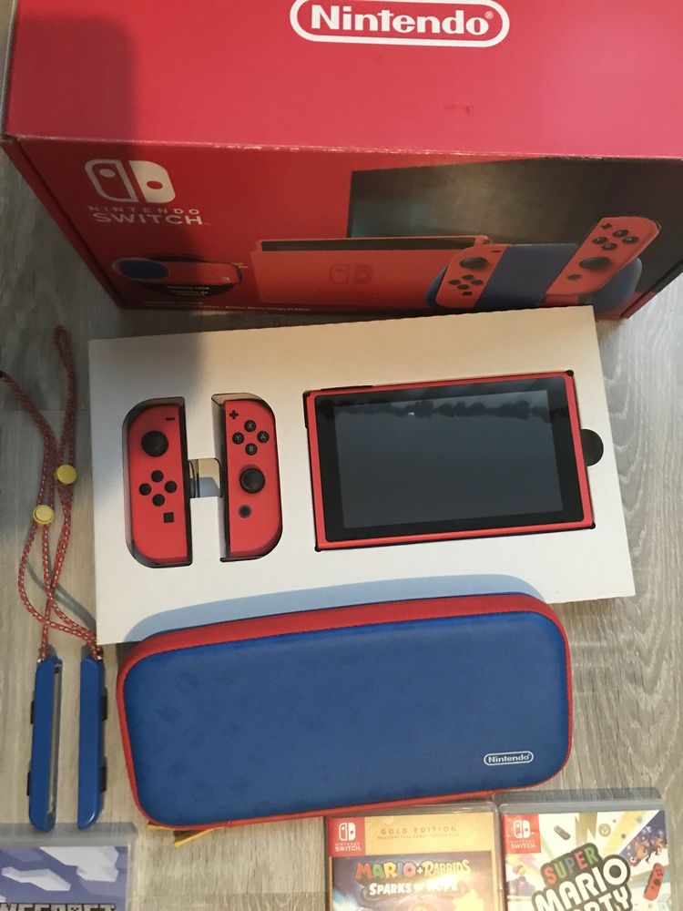 Nintendo Switch Mario Red & Blue Edition + 4 gry + opaska na noge