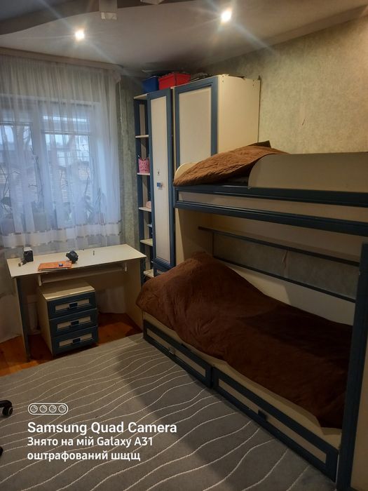 Продам дитяче двох ярусне ліжко із шкафами та столом