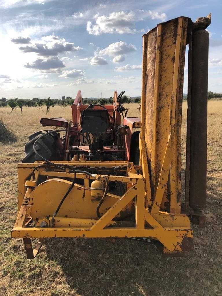 Limpa bermas destroçadora de martelos descentrada