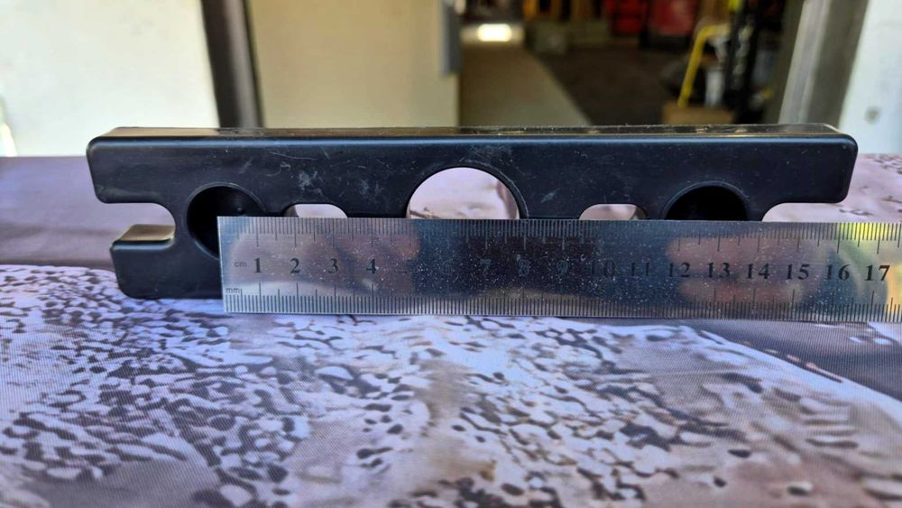 Mocowanie do prowadnic stosu na pręty fi 20mm