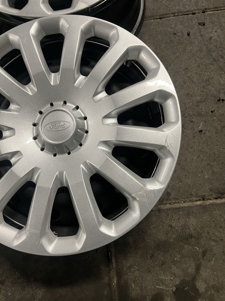 Felgi stalowe z kołpakami 6Jx15H2 ET47.5 4x108 Ford Fiesta Fusion KA