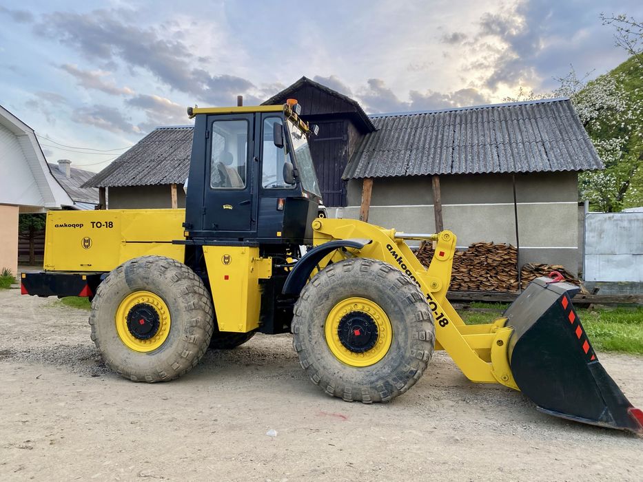 Амкадор ТО-18 навантажувач